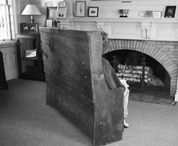 The fireplace in the reading room